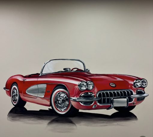Classic red convertible sports car with chrome accents and a white interior.